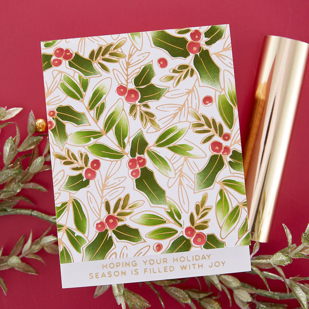Glimmer Holly Background Stencil from the De-Light-Ful Christmas Collection by Yana Smakula - Spellbinders